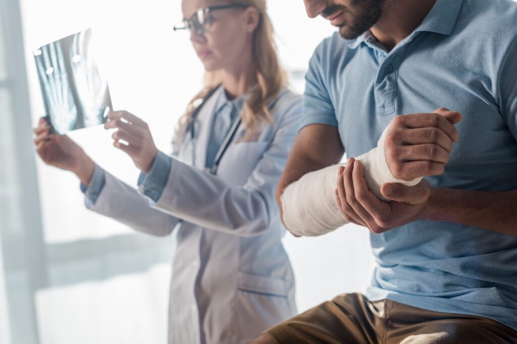 injured patient visiting the doctor after a car accident